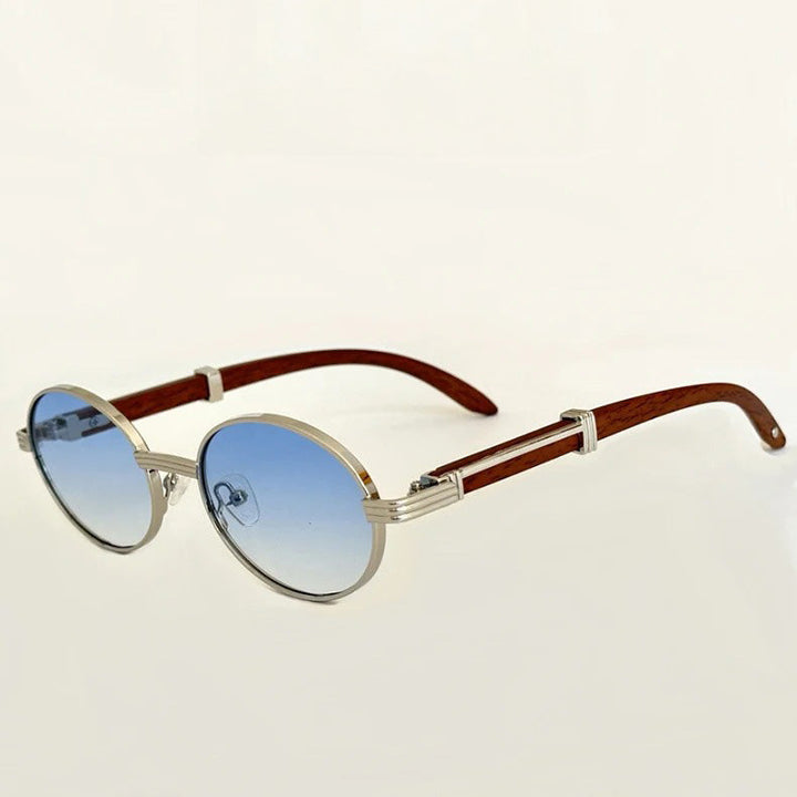 Vintage round sunglasses featuring UV400 protection, silver metal frames, blue gradient lenses, and stylish brown wooden temple arms, displayed on a white background.