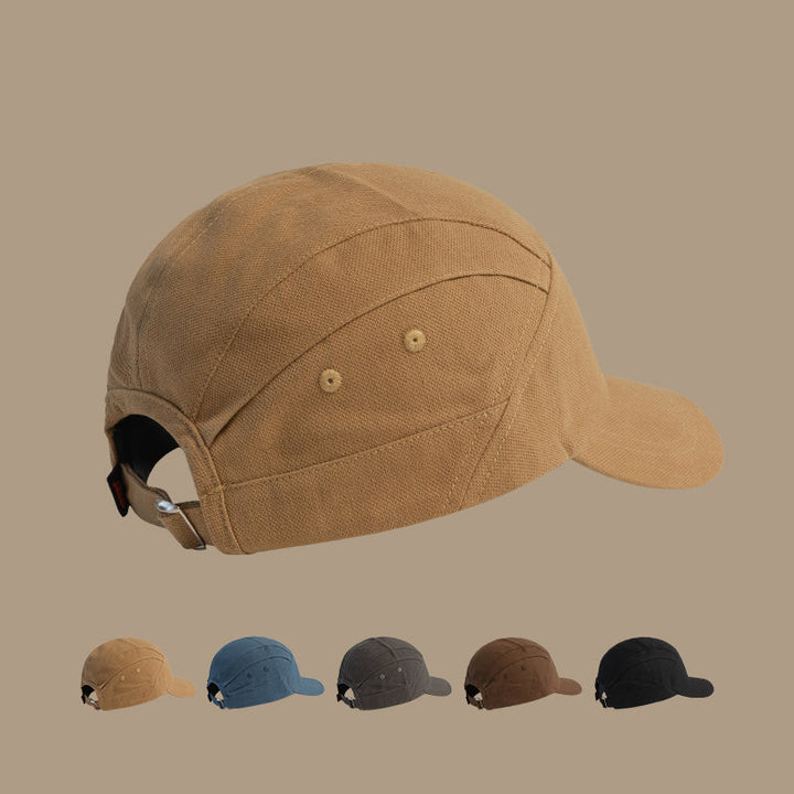 A side view of a tan Japanese-style peaked cap with an adjustable strap at the back. Below, smaller images show this unisex cap in tan, blue, dark gray, brown, and black, all set against a beige background.