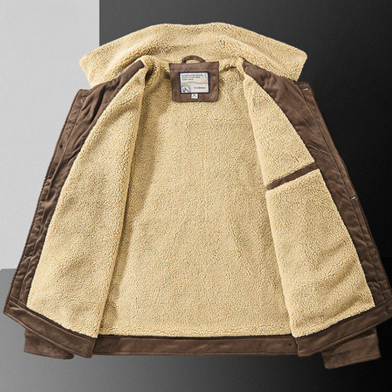 A brown jacket with a structured fit and soft Sherpa lining is laid open on a black and white background, revealing the cozy interior and multiple secure pockets.