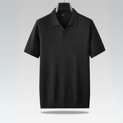 A short-sleeve black ribbed knit polo shirt with a collar and V-neck design, offering a lightweight polo feel, displayed on a hanger against a light gray background. Perfect for the urban professional.