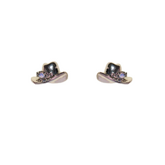 A pair of small silver cowboy hat statement earrings adorned with tiny purple and clear gemstones, displayed against a plain white background.