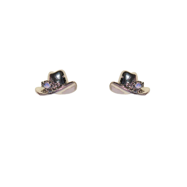 A pair of small silver cowboy hat statement earrings adorned with tiny purple and clear gemstones, displayed against a plain white background.