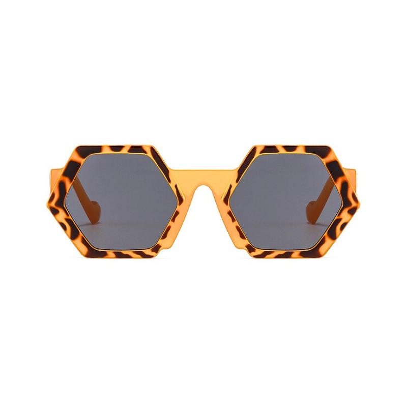 Trend-forward hexagonal frame sunglasses with bold, tortoiseshell patterns in orange and brown feature dark, tinted lenses and UV400 protection, all displayed against a white background.