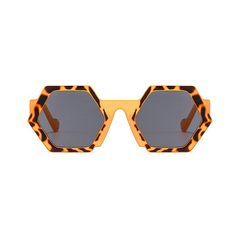 Trend-forward hexagonal frame sunglasses with bold, tortoiseshell patterns in orange and brown feature dark, tinted lenses and UV400 protection, all displayed against a white background.
