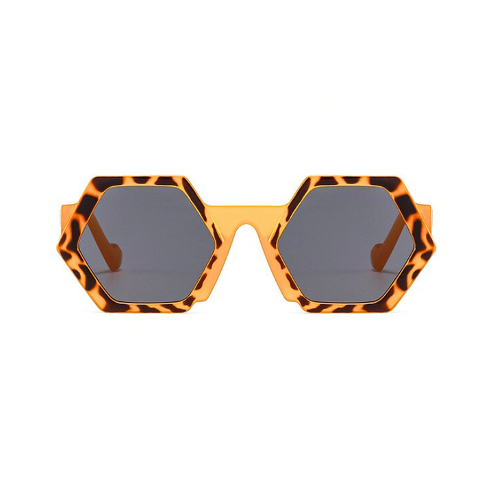 Trend-forward hexagonal frame sunglasses with bold, tortoiseshell patterns in orange and brown feature dark, tinted lenses and UV400 protection, all displayed against a white background.