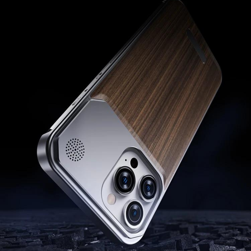 A smartphone with a triple-lens camera and a stylish wood phone case is shown at an angle against a dark, textured background. The metal frame and speaker grille are also visible.