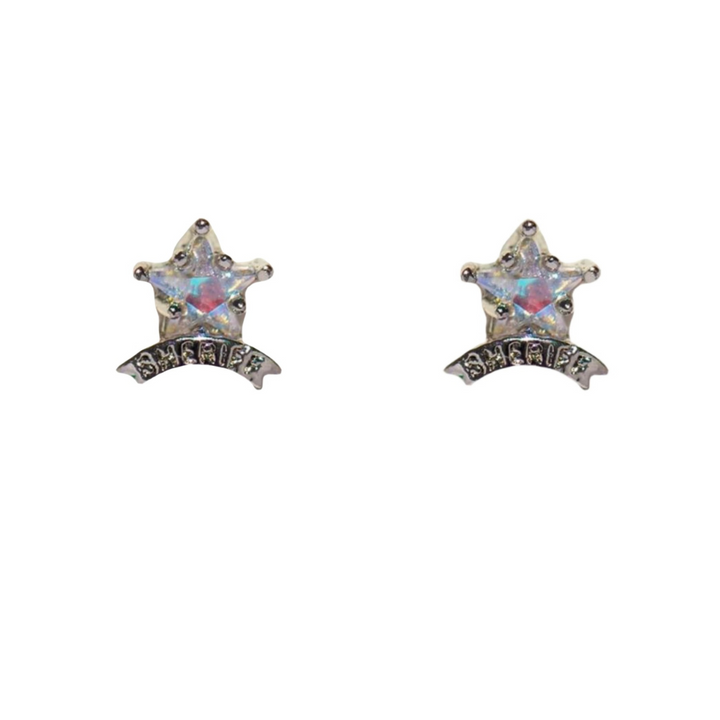 A pair of silver statement earrings shaped like five-pointed stars with iridescent centers, each featuring a curved banner below that reads SHERIFF in black letters. The earrings are displayed on a white background.