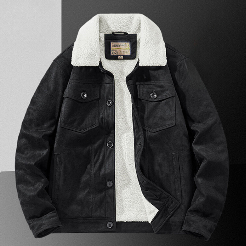 A black suede jacket with a white sherpa fleece collar and inner lining, featuring a structured fit, buttoned chest pockets, and front buttons, displayed on a color-blocked background.