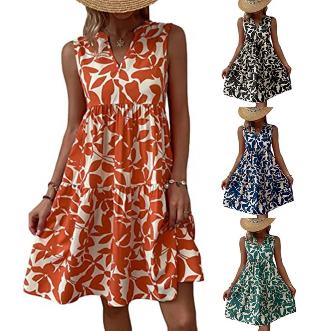 A woman in a sleeveless, knee-length dress with a bold floral print in orange and white—perfect for your summer wardrobe. Three smaller versions of the sleeveless dress in black, blue, and green with the same pattern are shown on the right.