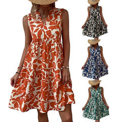 A woman in a sleeveless, knee-length dress with a bold floral print in orange and white—perfect for your summer wardrobe. Three smaller versions of the sleeveless dress in black, blue, and green with the same pattern are shown on the right.