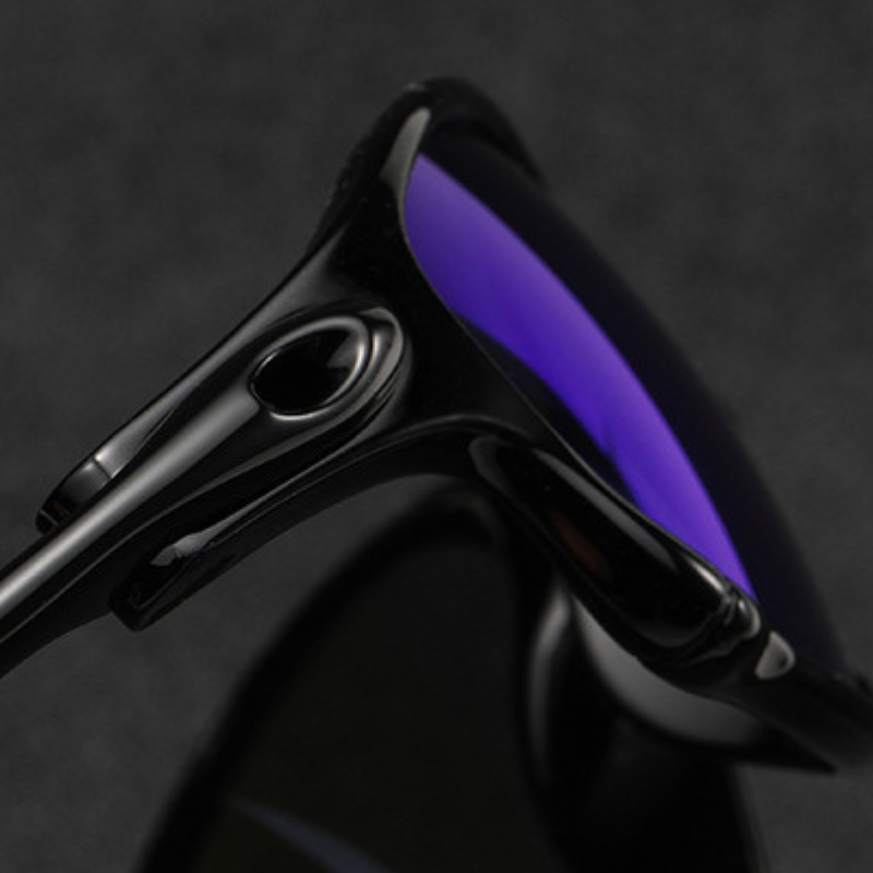 Close-up of sleek black cycling sunglasses with a rectangular frame and reflective purple lenses, offering UV400 protection against a dark background.