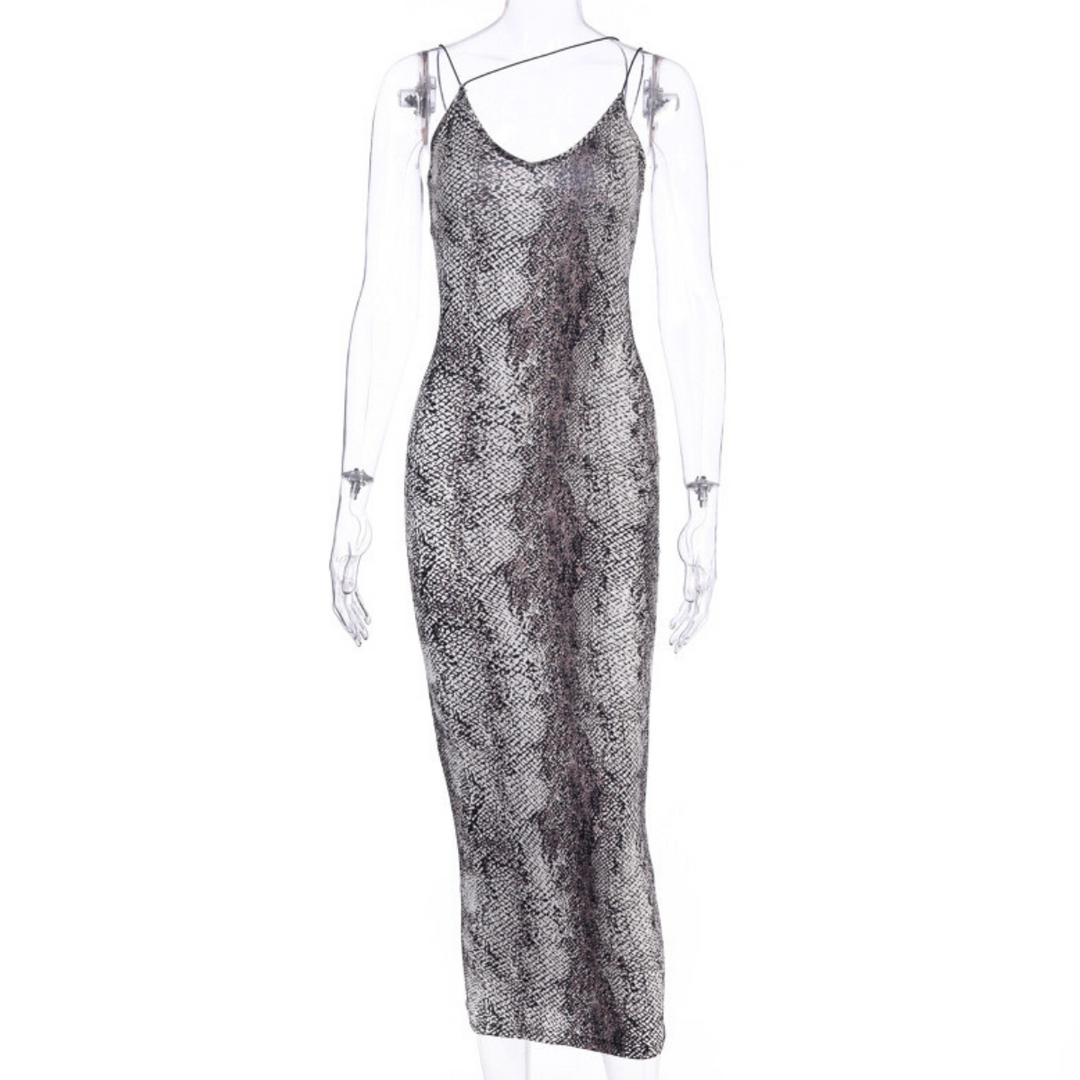 A sleeveless, ankle-length animal print dress with a gray and black snakeskin pattern, featuring thin spaghetti straps and a fitted silhouette displayed on a transparent mannequin.