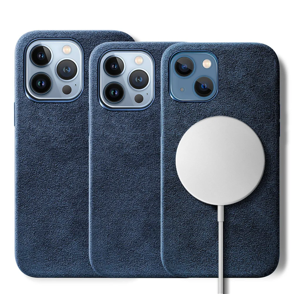 Three blue suede finish phone cases for iPhones are shown, each with a protective design. One case features a round white MagSafe charger attached to its back, and the camera cutouts indicate compatibility with different iPhone models.