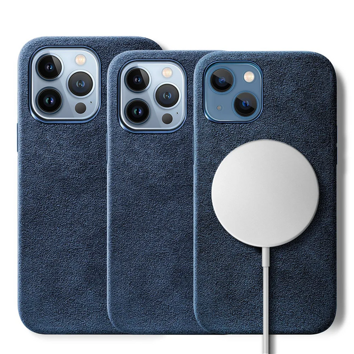 Three blue suede finish phone cases for iPhones are shown, each with a protective design. One case features a round white MagSafe charger attached to its back, and the camera cutouts indicate compatibility with different iPhone models.