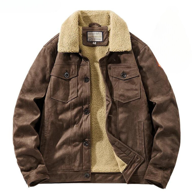 A brown suede jacket with a light beige Sherpa lining and collar, featuring buttoned chest pockets, front buttons, and side pockets. The jacket is laid flat with the front partially open to show the cozy lining.