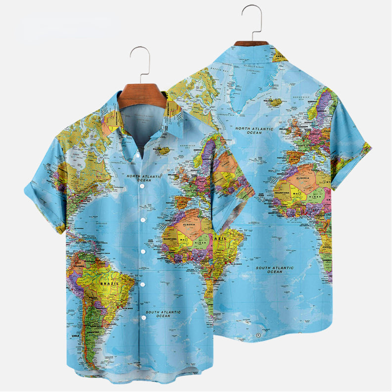 Two short-sleeve button-up Hawaiian shirts hang on wooden hangers. Each features a colorful world map print, showcasing the Americas and parts of Europe and Africa—perfect for adding adventure to your summer wardrobe.