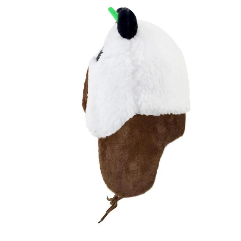 A plush hat resembling a panda face with white and brown fur, a small green stem on top, and floppy brown sides. Crafted from soft plush material, the hat is shown from the side against a white background.