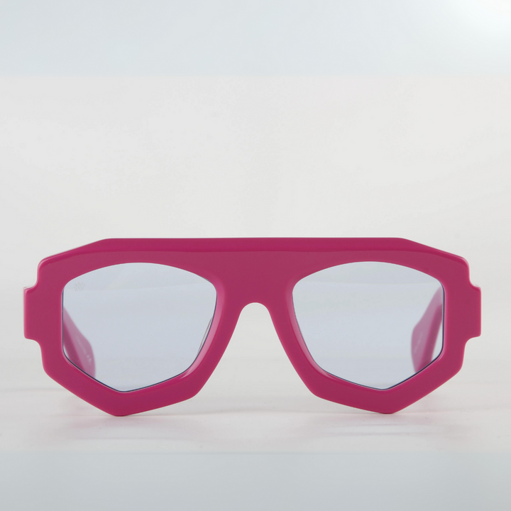Pink, oversized acetate geometric frame sunglasses with clear lenses and UV400 protection, displayed against a plain white background, facing forward.