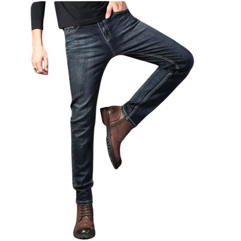 A person wearing dark blue slim-fit jeans, a black long-sleeve shirt, and brown lace-up boots poses with one leg bent and the other straight, against a white background.