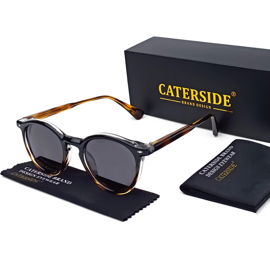 A pair of round, tortoiseshell polarized sunglasses with dark lenses sits beside a black CATERSIDE box, a branded cleaning cloth, and a carrying pouch, all arranged neatly on a white background.