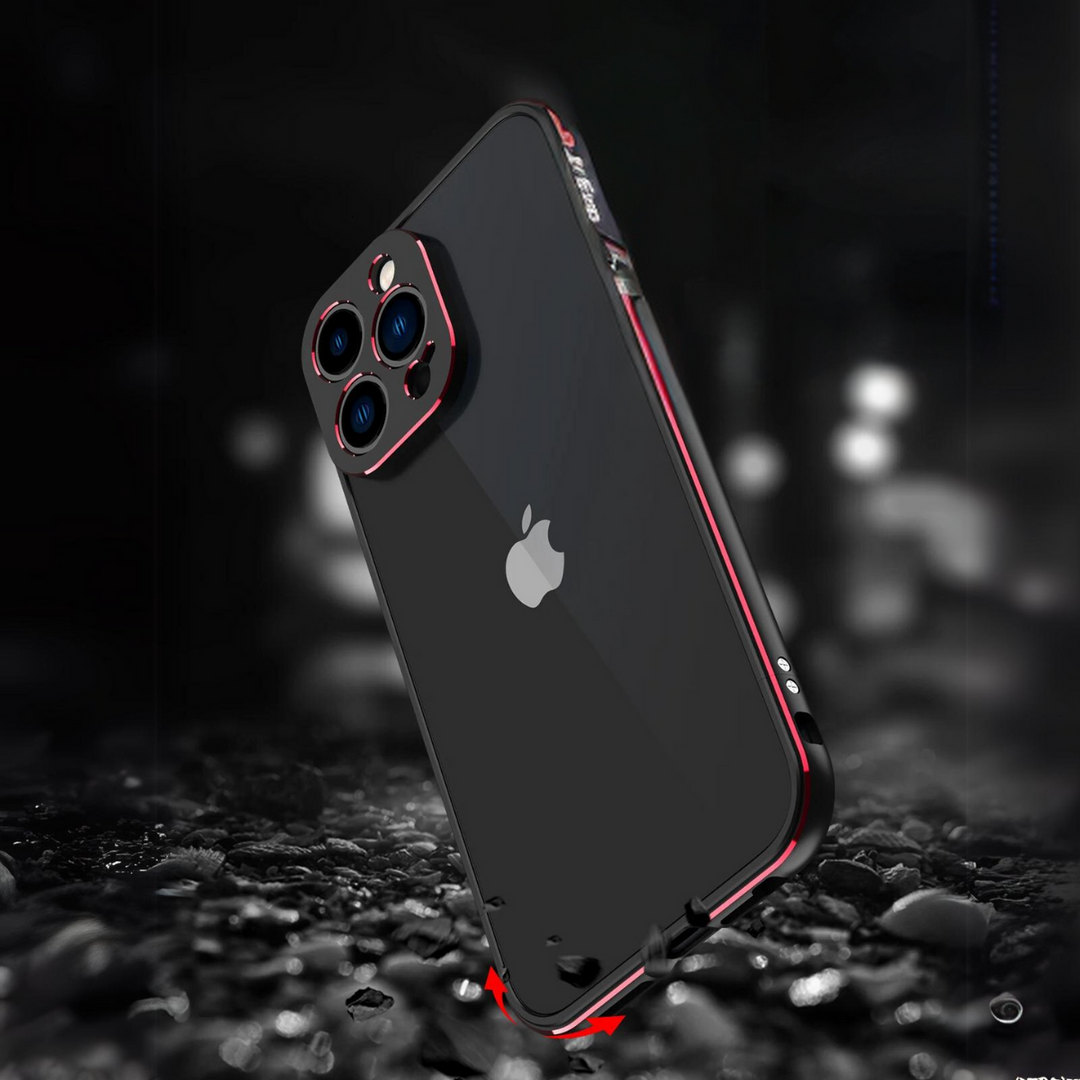 A black iPhone with a durable phone case in red and black stands upright on a wet, reflective surface, with blurred lights illuminating the dark background.