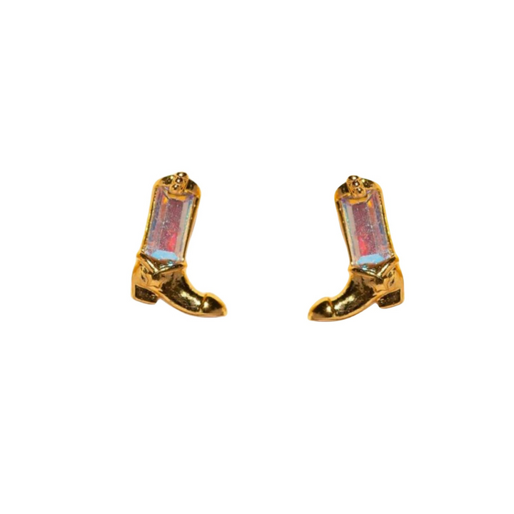 A pair of gold cowboy boot-shaped statement earrings with iridescent accents on the shaft, shown against a white background.