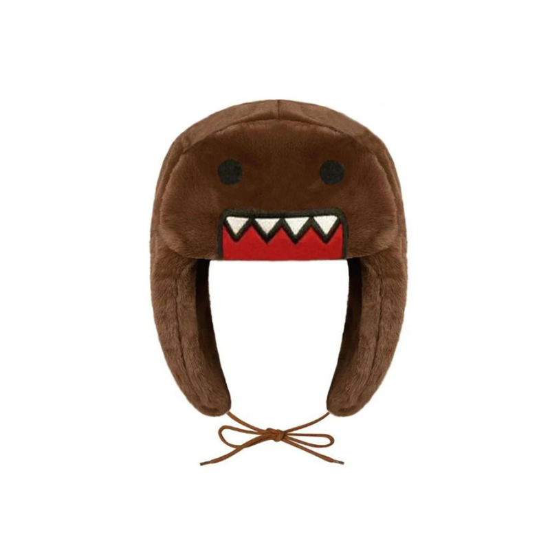 A fuzzy brown trapper hat designed to resemble Domo-kun, crafted from plush material with black eyes, a red mouth with white jagged teeth, adjustable ear flaps, and brown strings for tying under the chin—perfect for winter styling.
