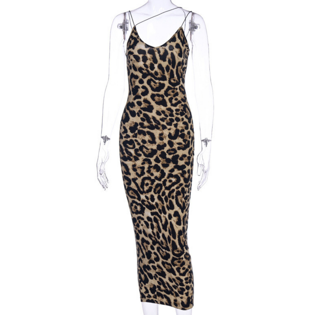 A sleeveless, bodycon midi leopard print dress with thin spaghetti straps and bold tan, brown, and black patterns, displayed on a transparent mannequin—perfect as your go-to summer statement dress.