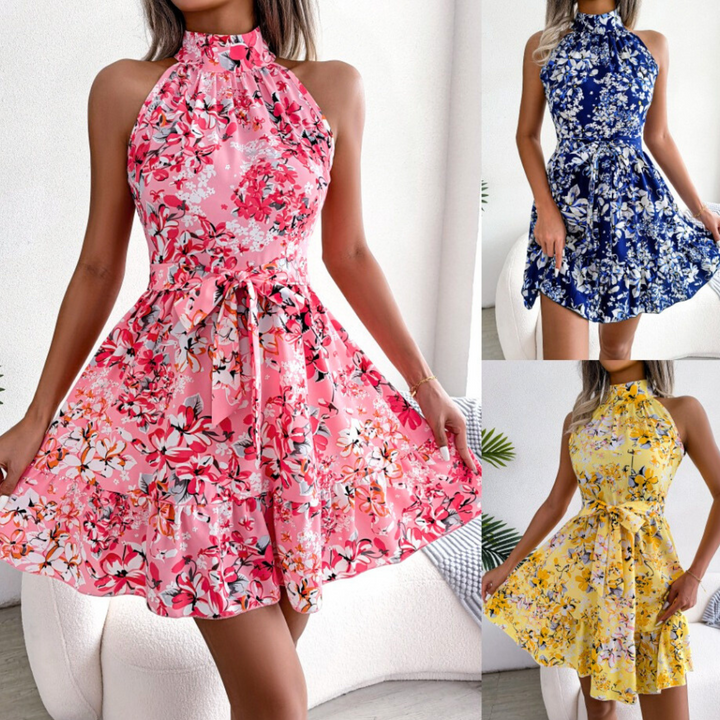 A woman models a sleeveless, halter neck floral dress in pink—perfect for your summer wardrobe. Smaller images on the right show this chic style in blue and yellow floral prints, all featuring a tie waist and flared skirt.