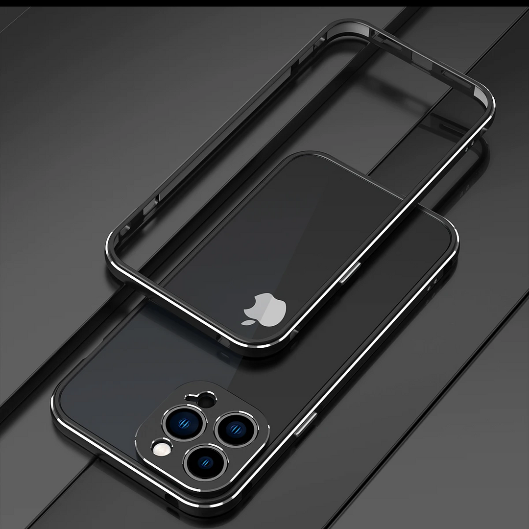 A black smartphone with a triple-lens camera and an Apple logo lies on a sleek, dark surface next to a matching aluminum case that offers superior drop protection.