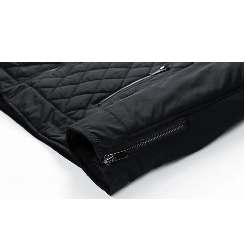 A close-up view of a black, wind-resistant quilted jacket sleeve with a visible zipper on the cuff and another zipper pocket above it, displayed on a white background.