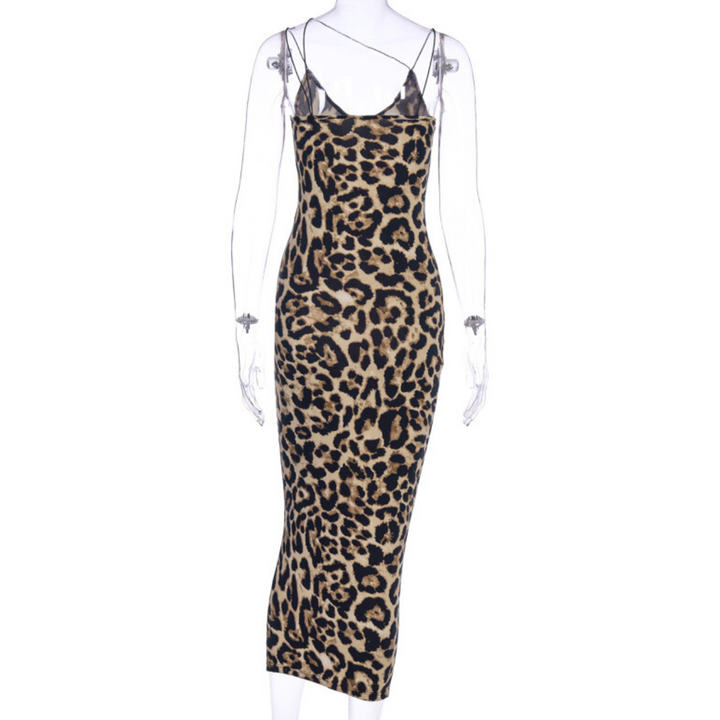 A sleeveless, form-fitting, ankle-length animal print dress with a bold leopard pattern and black spaghetti straps is displayed on a clear mannequin.