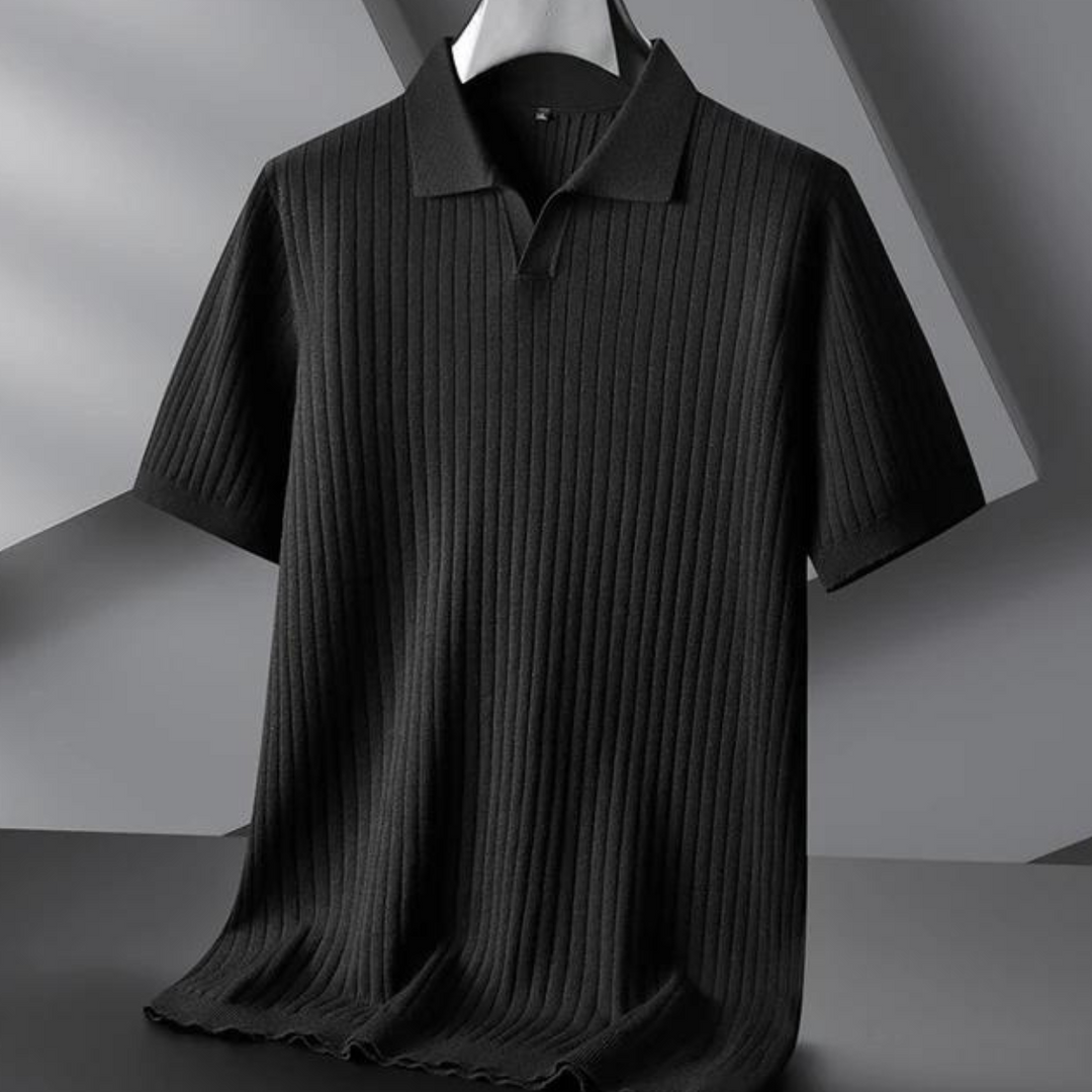 A black, short-sleeve, lightweight ribbed knit polo shirt displayed on a hanger against a modern, geometric gray background—perfect for the urban professional.
