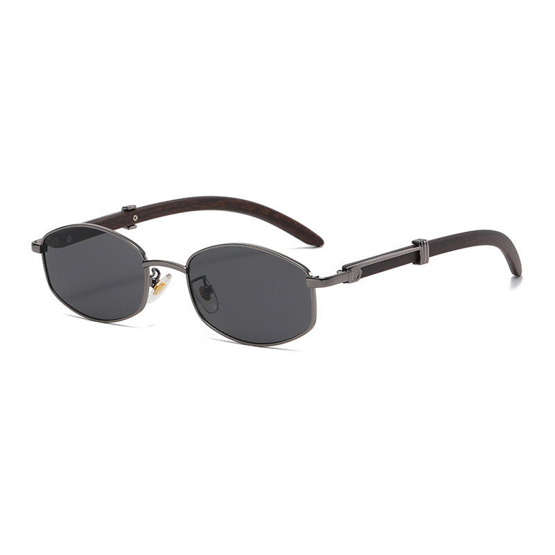 A pair of stylish, vintage-inspired sunglasses with dark oval lenses, gold-tone frames, and curved brown arms. Enjoy classic flair and UV400 protection for your eyes.