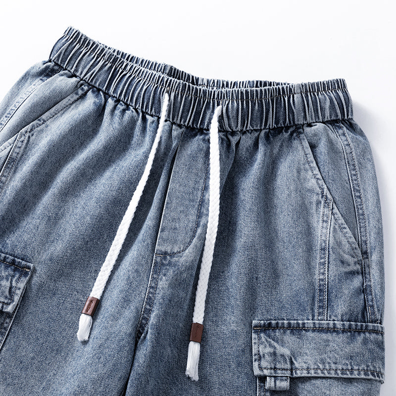 A pair of blue jeans featuring an elastic waist for added comfort.
