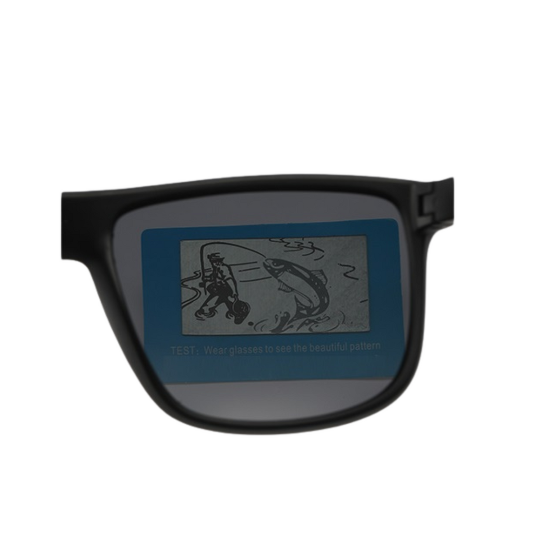 A black-rimmed UV400 sunglass lens shows a hidden image of two fish and water, revealed only when viewed through the stylish sunglasses. Text below reads: TEST: Wear glasses to see the beautiful pattern.