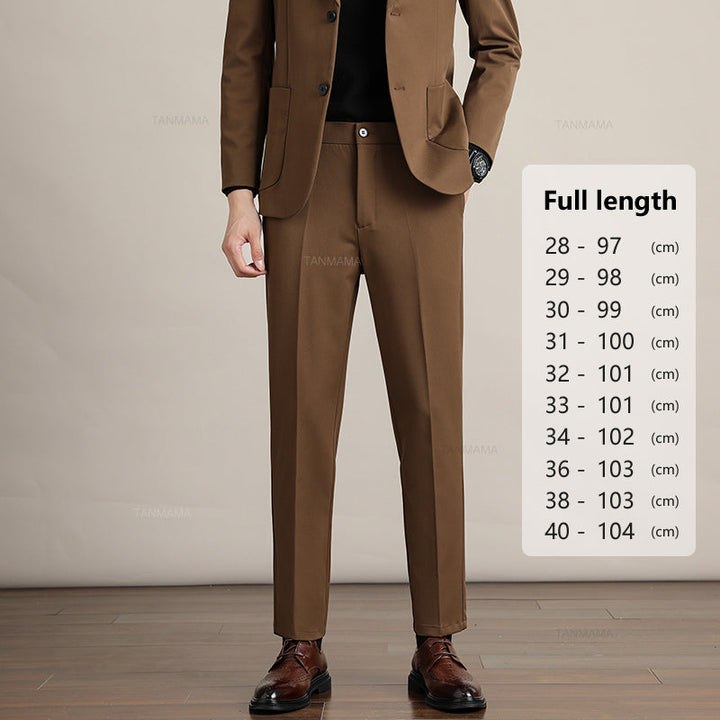 A man in a brown suit stands on a wood floor against a beige background. Next to him, a size chart for Mens Slim Casual Trousers in premium fabric shows pant lengths from 97 cm to 104 cm for sizes 28 to 40.