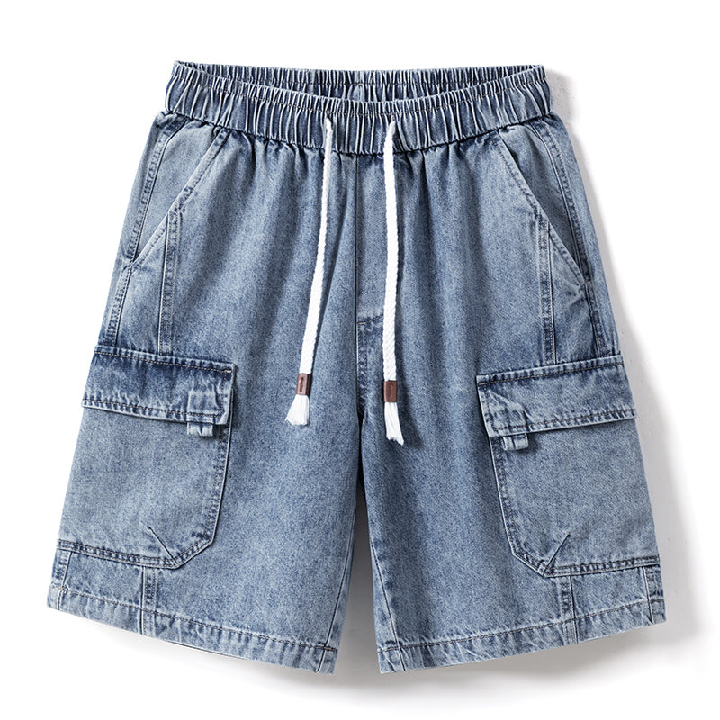 Light blue mens denim shorts with an elastic waist, white drawstring, two side pockets, and two large flap pockets on each leg, displayed on a white background.