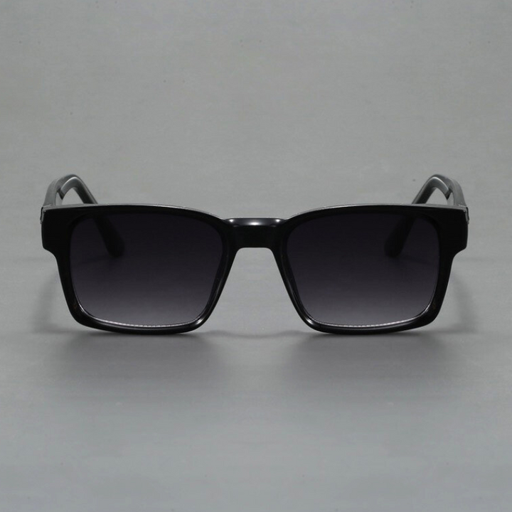 A pair of black square-framed sunglasses with durable frames and dark tinted lenses, featuring modern design and UV400 protection, displayed against a plain grey background.