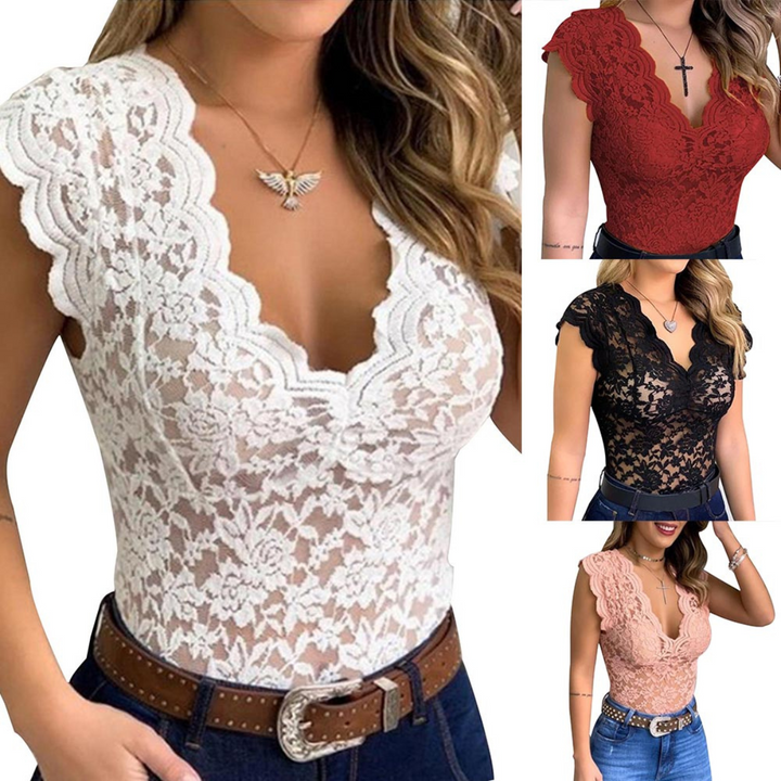 A woman models a fitted, sleeveless lace top with a scalloped V-neckline, perfect for summer fashion. The streetwear-inspired top is shown in white, red, black, and blush pink. She pairs it with jeans and a brown belt.