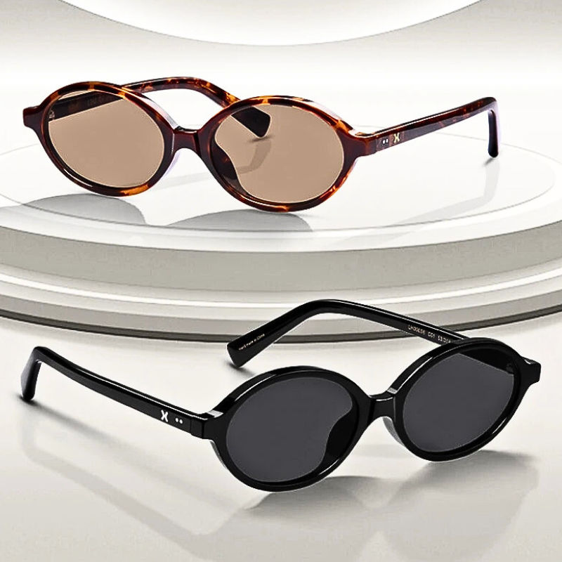 Two pairs of retro oval sunglasses displayed on a white tiered platform: one with a lightweight acetate frame in tortoiseshell and brown lenses on the upper tier, and one with a black frame and dark lenses—both offering UV400 protection.
