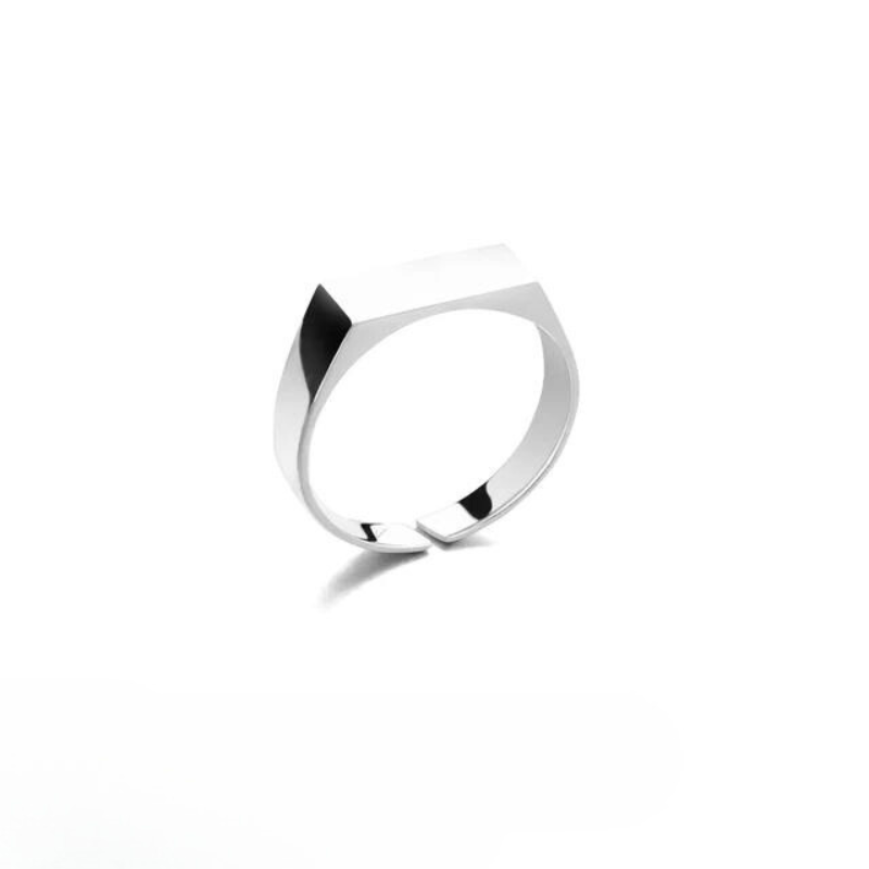 A minimalist, scratch-resistant silver ring with a flat, rectangular top and smooth, polished band, displayed on a white background.