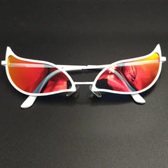White cat-eye sunglasses with red reflective, polarized lenses and UV400 protection lie on a black surface. The lightweight frame features pointed, winged edges, giving them a dramatic and unique appearance.