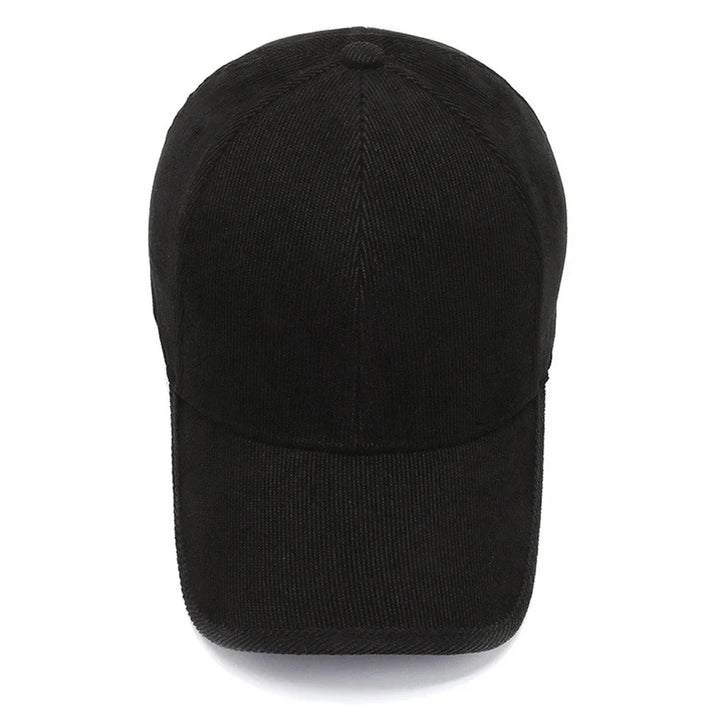 A plain black baseball cap, inspired by classic retro hats, viewed from the front against a white background.