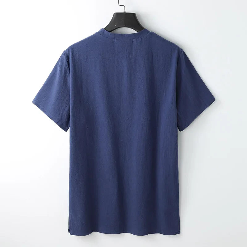 A plain navy blue short-sleeve t-shirt made from lightweight breathable fabric, displayed on a black hanger and shown from the back against a white background—perfect for effortless summer style.