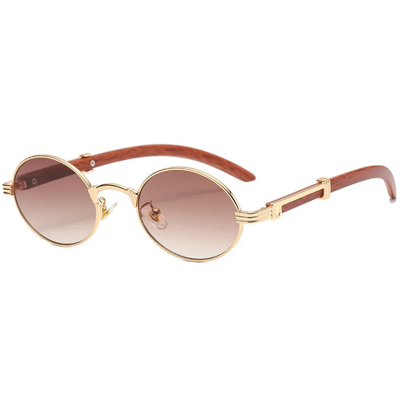 Gold-rimmed oval vintage sunglasses with brown gradient lenses and wooden arms, featuring UV400 protection, shown on a white background.