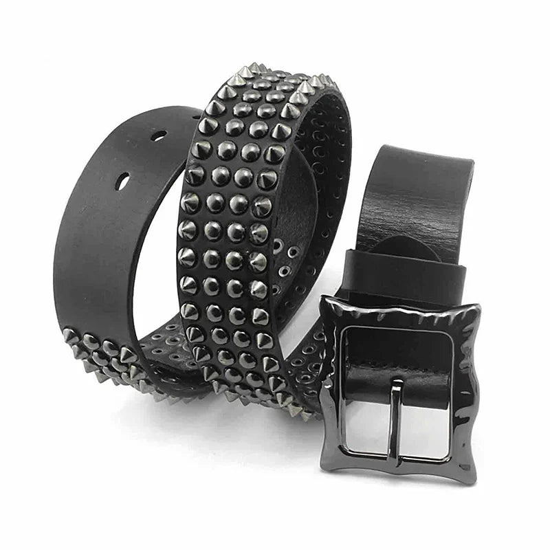 A black leather belt with studded detailing and a shiny, adjustable square-shaped silver buckle, displayed coiled on a white background.