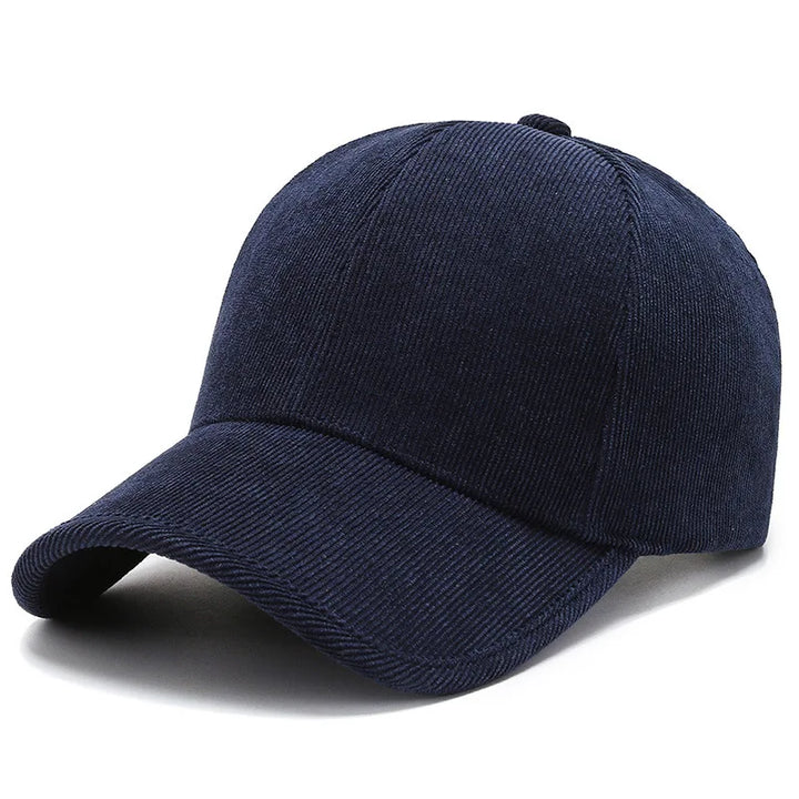 A navy blue corduroy baseball cap with a curved brim, shown on a white background—a stylish choice for fans of classic corduroy hats.