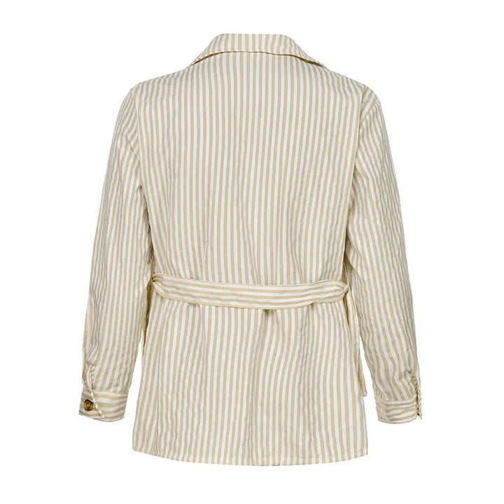 Back view of a beige and white vertically striped jacket in a tailored fit, crafted from a premium cotton blend, featuring an adjustable belt at the waist and buttoned cuffs.