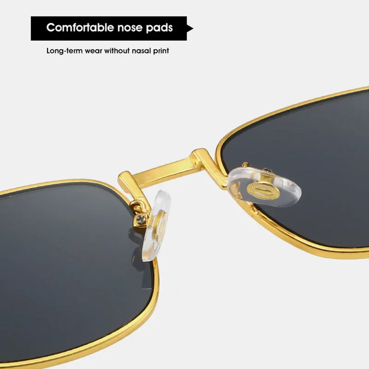 Close-up of square retro sunglasses with gold frames and black lenses, featuring clear, adjustable nose pads for comfort. Enjoy long-term wear without nasal print and reliable UV protection.